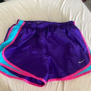 Purple Nike running shorts